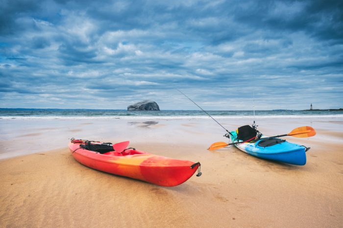 blue and red fishing kayaks